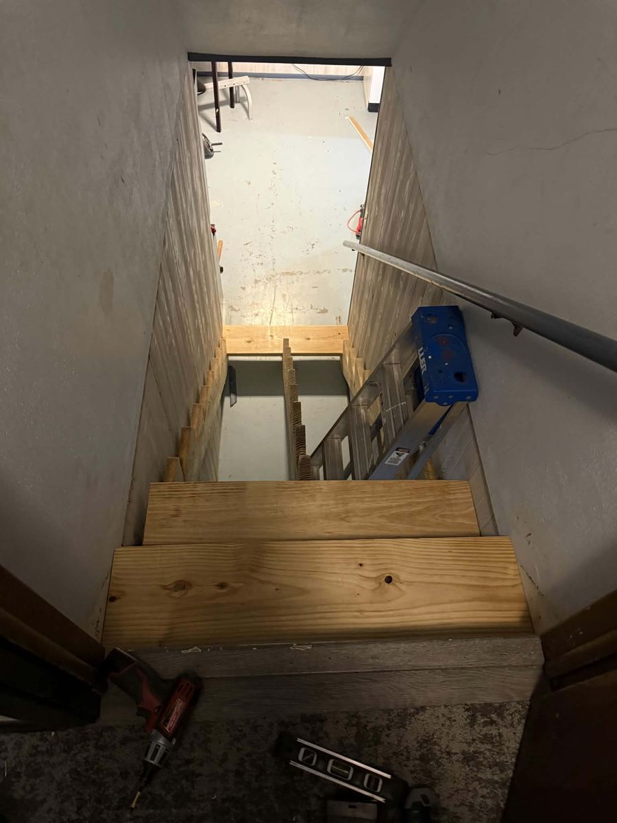 New stair stringers and treads framed in during the rebuild