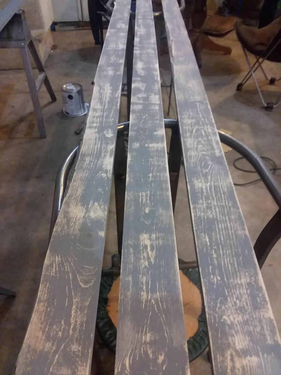 Custom bench planks finished in a grey weathered stain