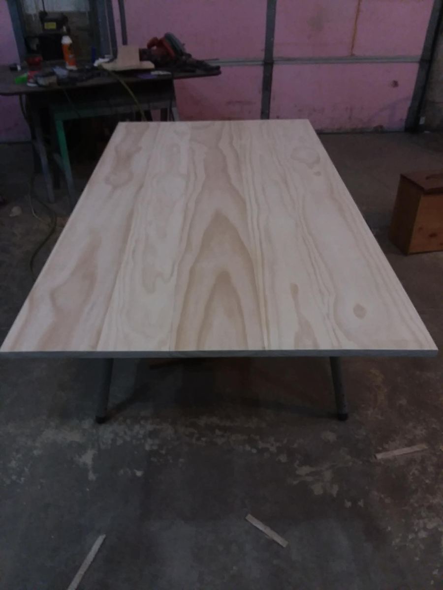Raw timber table top built and sanded in the shop
