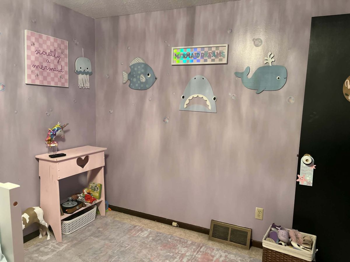 Child's bedroom painted lavender and decorated
